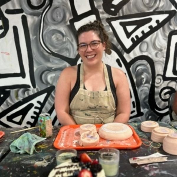 San Diego pottery studio member with ceramic creations.