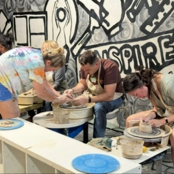 Pottery Wheel throwing class in session at The Pottery Outpost.